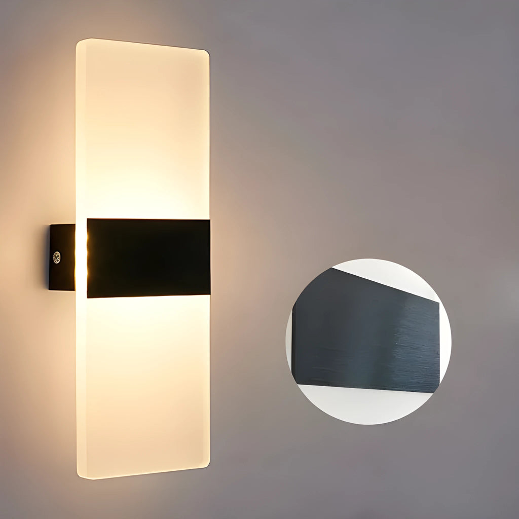 Black acrylic LED wall lamp with modern design mounted on wall