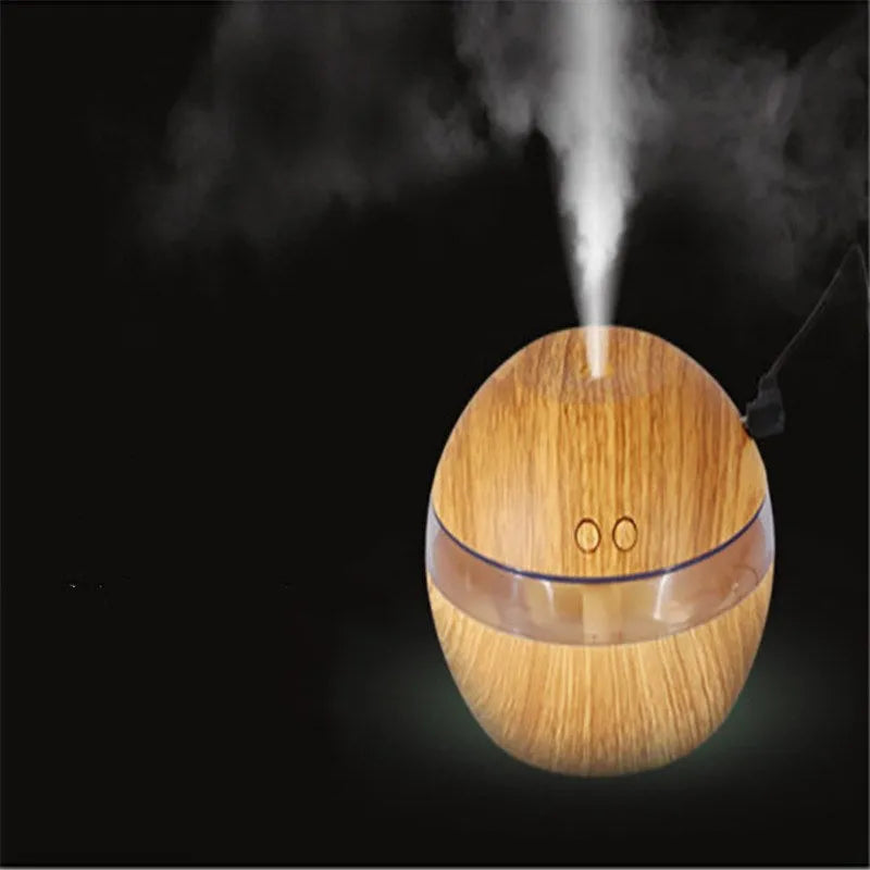 Brown wood grain USB desktop humidifier with 200ml water tank on a desk