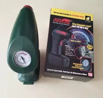 Black handheld portable 12V car tyre pump with digital display and LED light on inflation hose