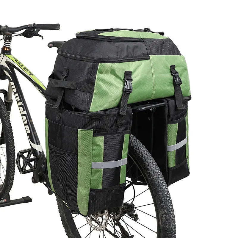 Rhinoceros brand green 70 litre bicycle rear frame storage bag mounted on a bike for touring.