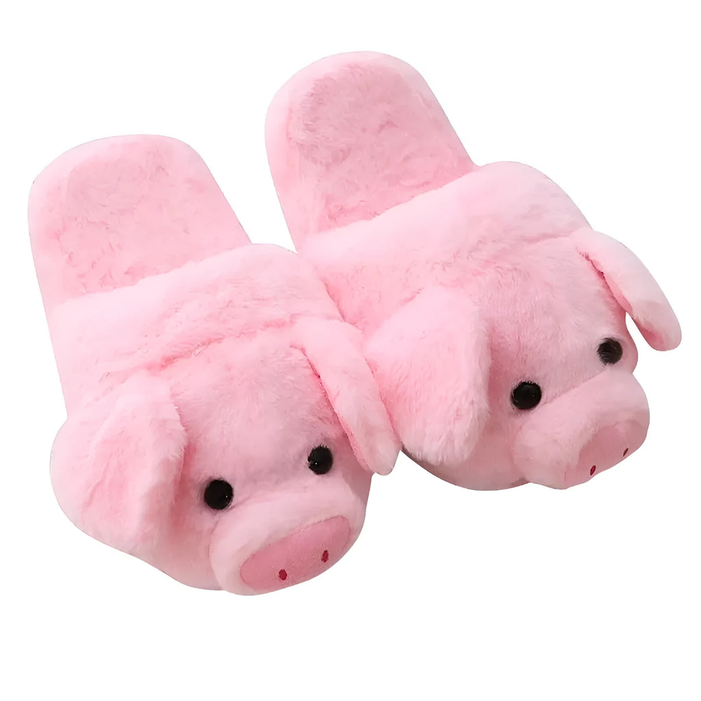 Pink pig-shaped plush floor slippers with short plush exterior.