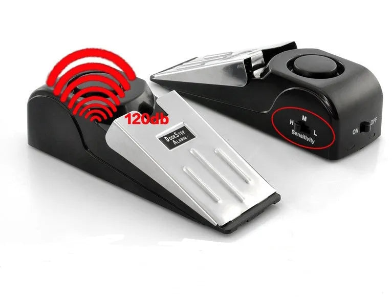 Black portable wedge-shaped door stop alarm with a stainless steel cover for home and travel security.