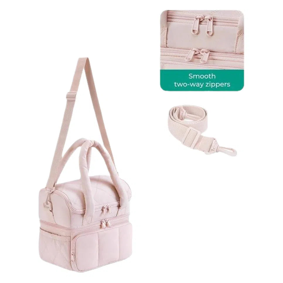 Double-layer insulated quilted pufferfish lunch bag in pink with curved shoulder straps and patchwork details