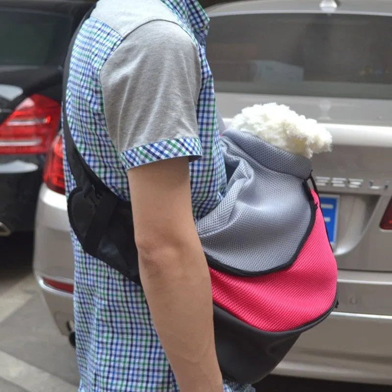Blue pet backpack for small dogs showing size dimensions and carrying straps.