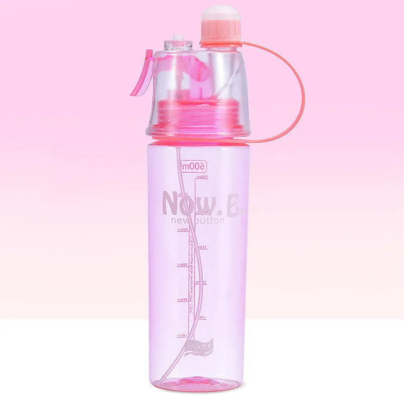 Portable outdoor sports mist spray cup with handle, transparent body showing scale markings, and spray mouth