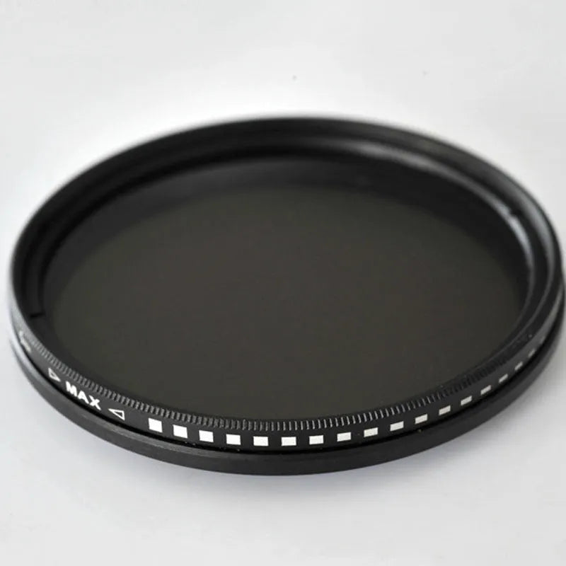 Set of neutral density camera lens filters in ND2, ND4, ND8, and ND400 with various thread sizes from 37mm to 95mm.