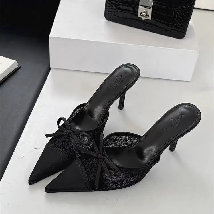 Light brown women's lace high heels with a pointed toe and a decorative bowknot on the upper.