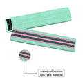 Set of three coloured fabric resistance bands and a mesh storage bag on a light background.