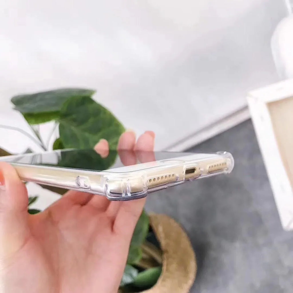 Mirror-finish TPU protective case for iPhone on a table.