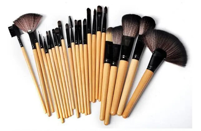 24 professional makeup brushes with wooden handles in a gift bag including eyebrow, foundation and powder brushes