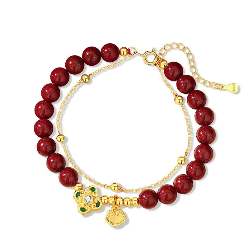 Women's sterling silver bracelet with Ruyi, Xiangyun and cinnabar flower traditional motifs