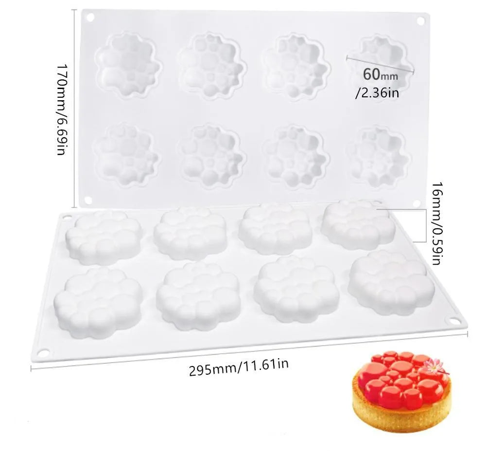 Round silicone baking mould with eight raised bubble cavities for tower cakes.