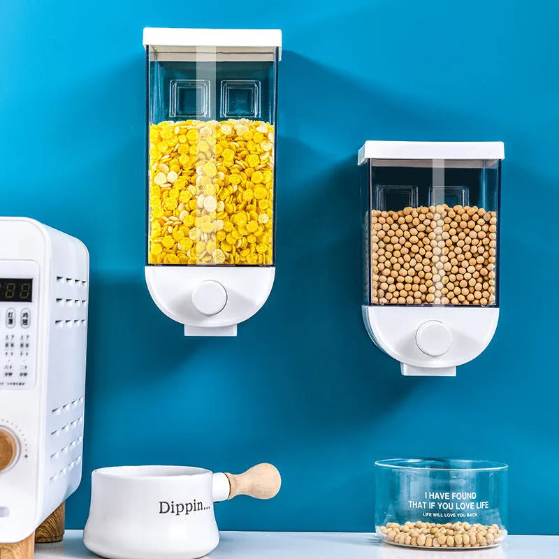 White wall-mounted transparent kitchen storage container with cereal dispenser lid