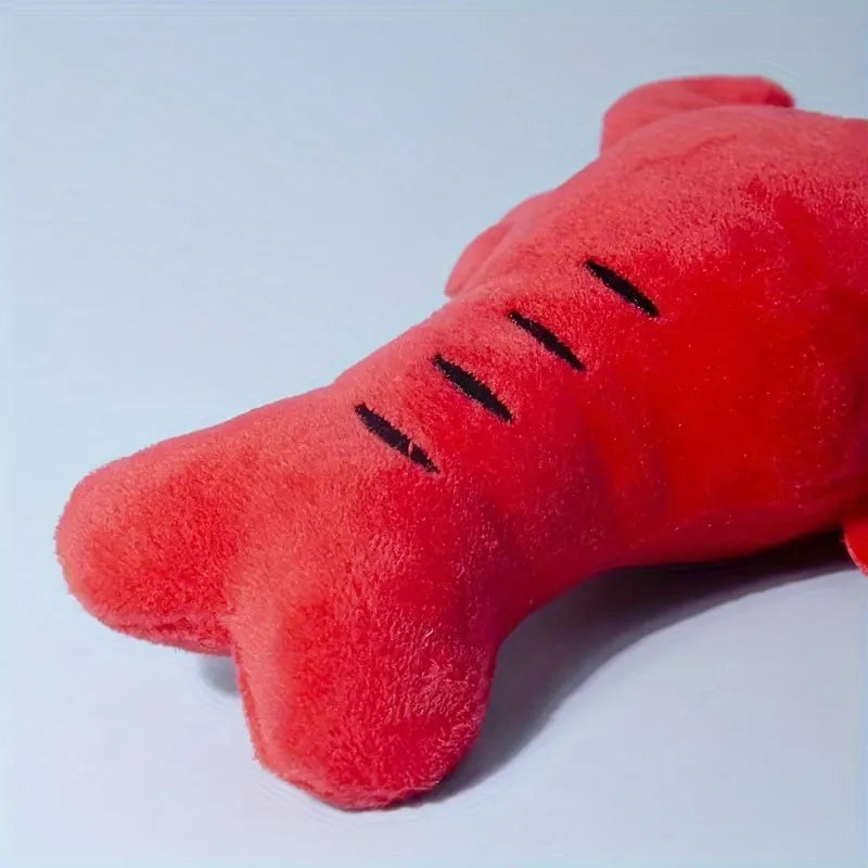 Red lobster-shaped squeaky dog toy for small to medium breeds