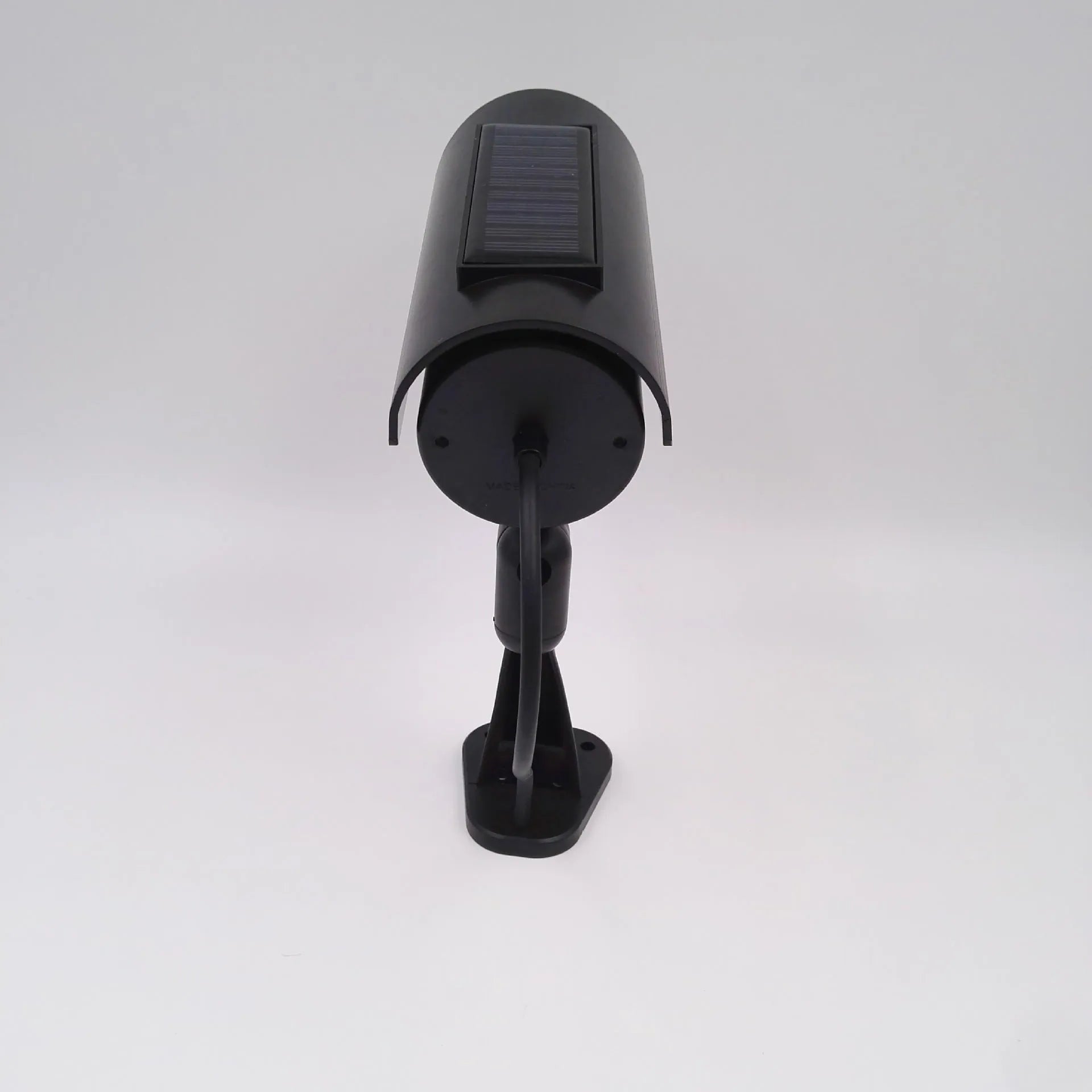 Black plastic solar simulation gun camera dummy security unit with flashing LED light