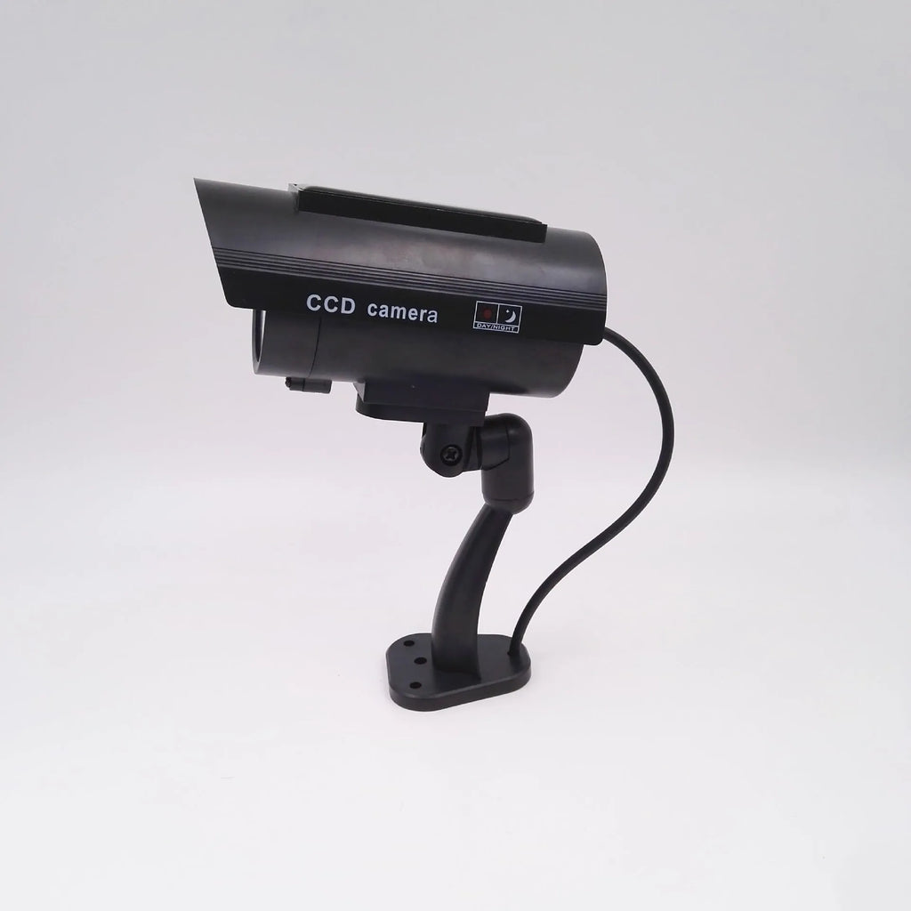 Black plastic solar simulation gun camera dummy security unit with flashing LED light