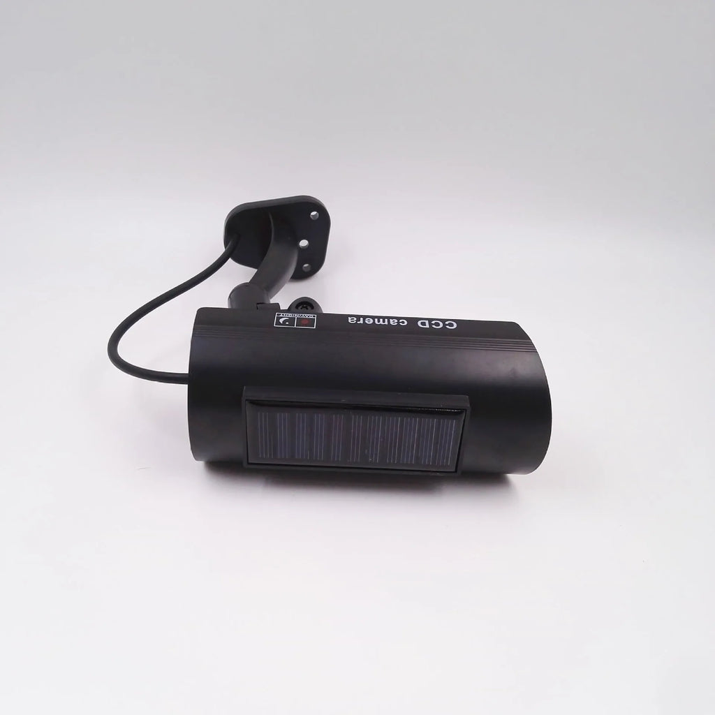 Black plastic solar simulation gun camera dummy security unit with flashing LED light