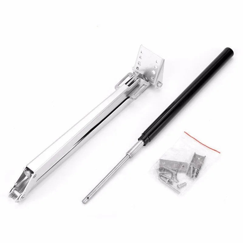 Silver and black aluminium alloy automatic greenhouse window opener kit with installation fittings.