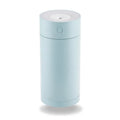 Compact white folding bracket USB desktop humidifier on a wooden desk