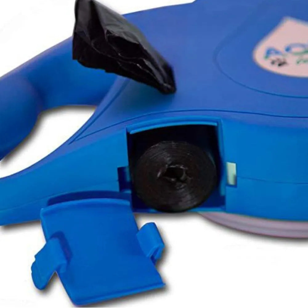Blue retractable dog leash with ergonomic handle and silicone folding bowl on grass