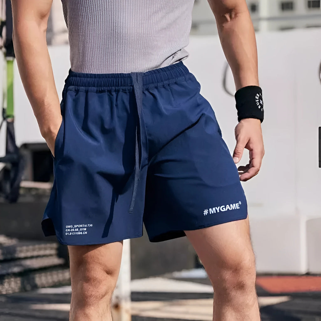 Men's grey fitness training shorts with moisture-wicking quick-dry polyester fabric for summer workouts