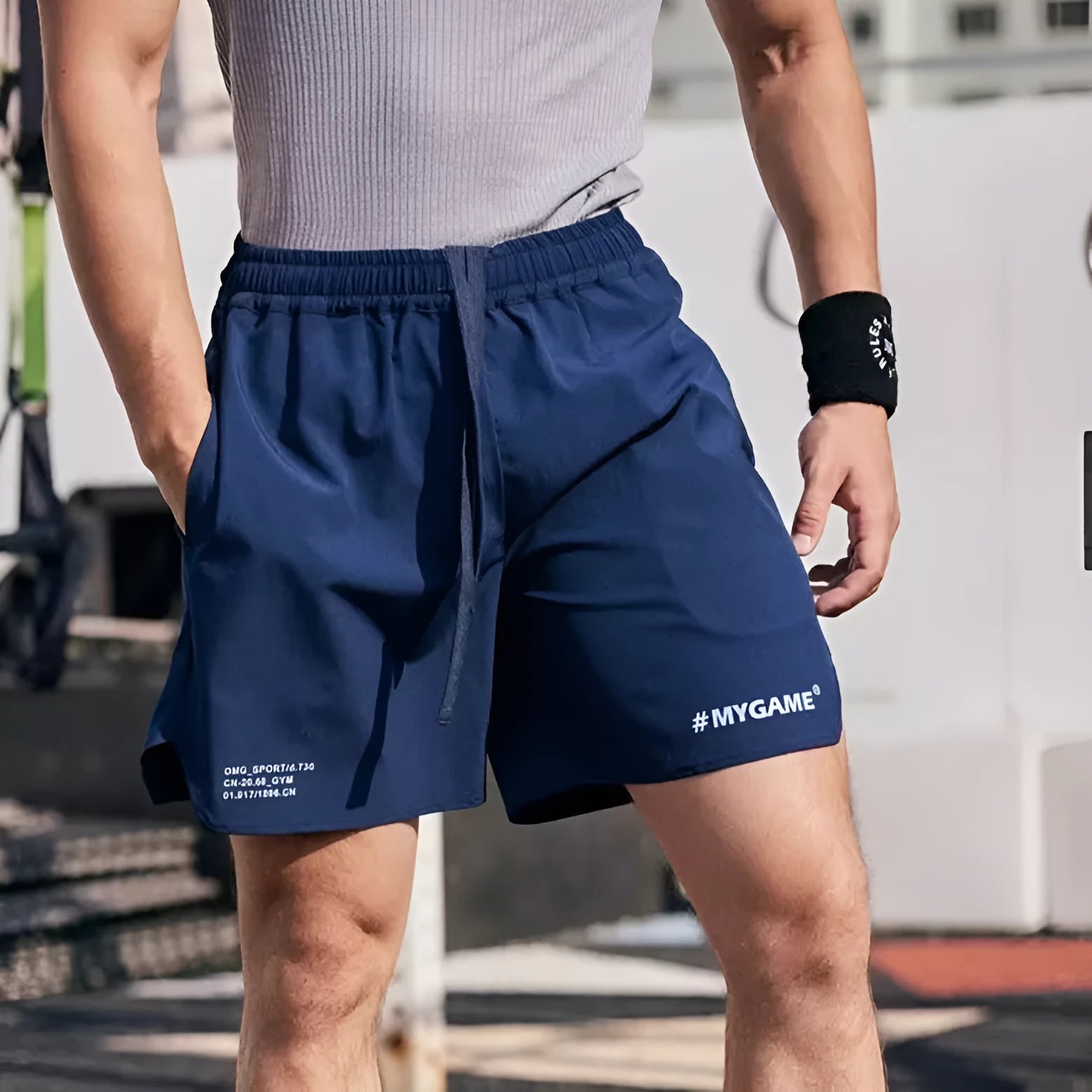 Men's grey fitness training shorts with moisture-wicking quick-dry polyester fabric for summer workouts