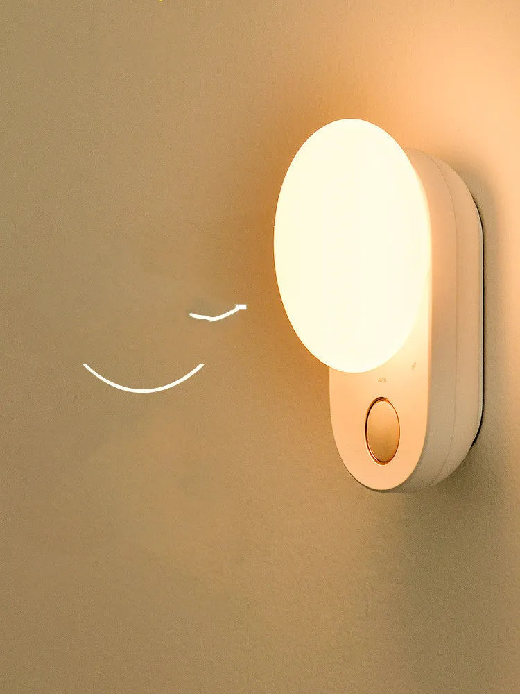 White rechargeable night light with motion sensor for bedside use