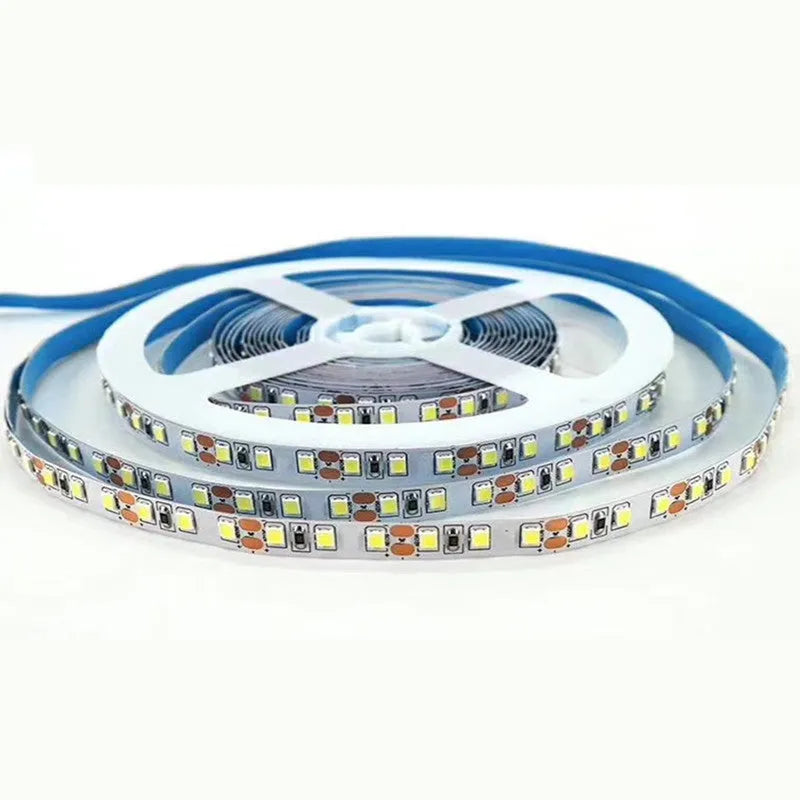 2835 and 5050 white LED light strip on a reel for commercial shelf lighting.