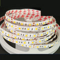 2835 and 5050 white LED light strip on a reel for commercial shelf lighting.