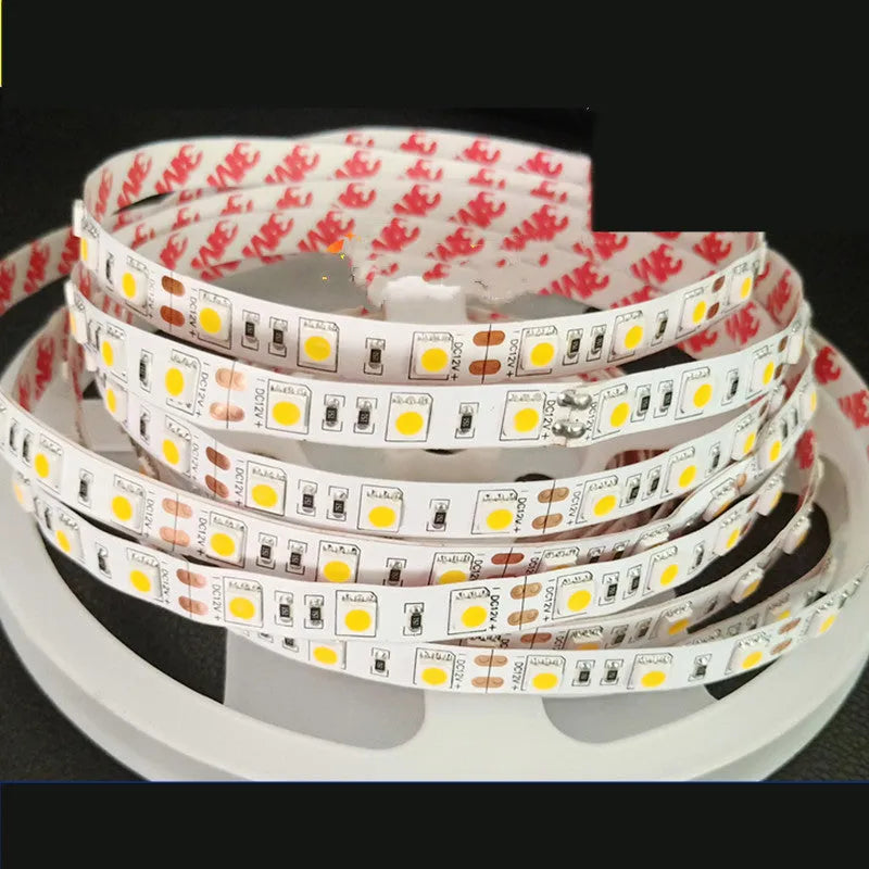 2835 and 5050 white LED light strip on a reel for commercial shelf lighting.