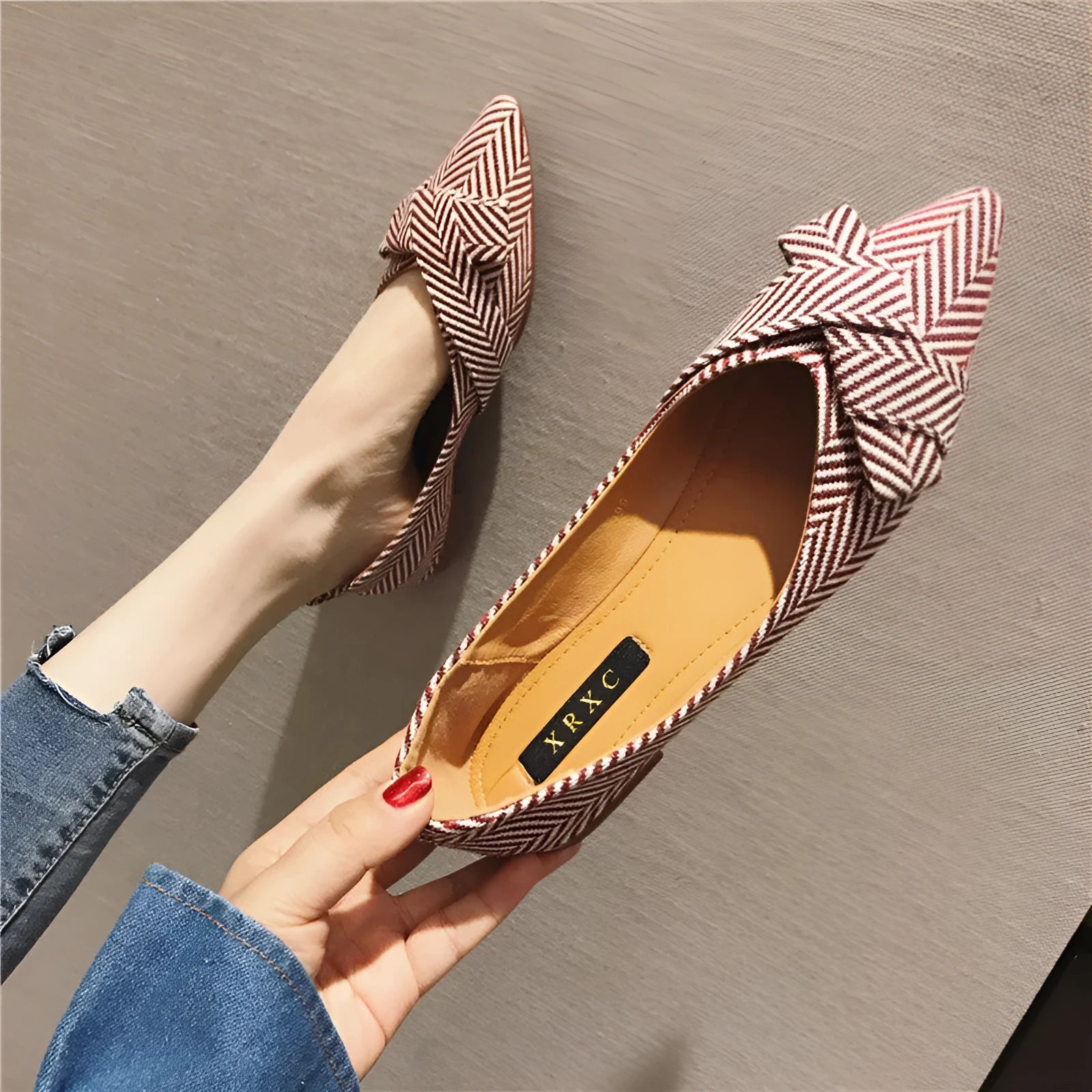 Women's pointed shallow mouth flats in black and red colours with cotton upper and low flat heel