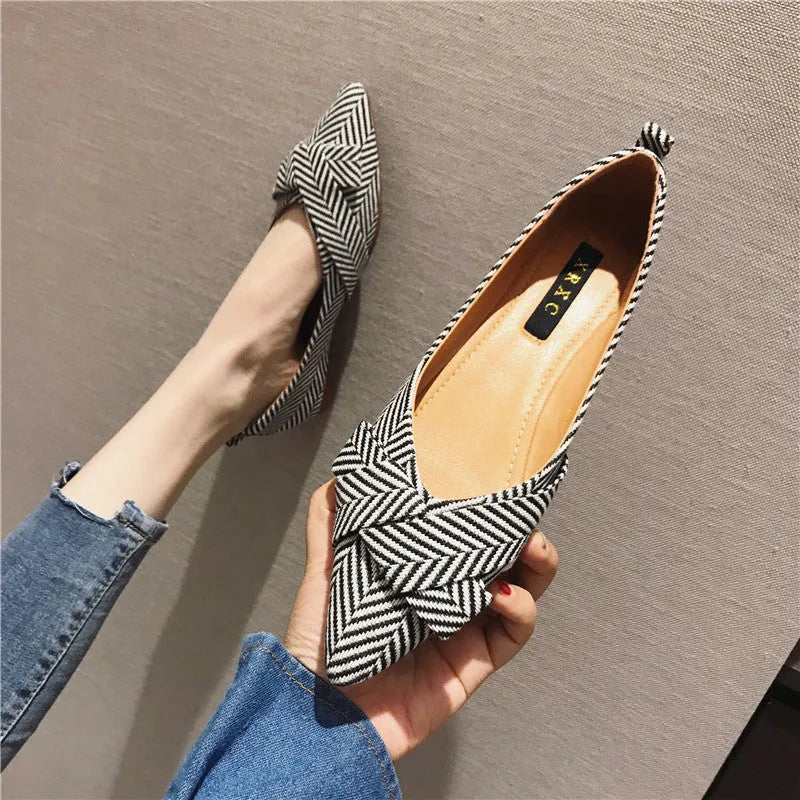 Women's pointed shallow mouth flats in black and red colours with cotton upper and low flat heel