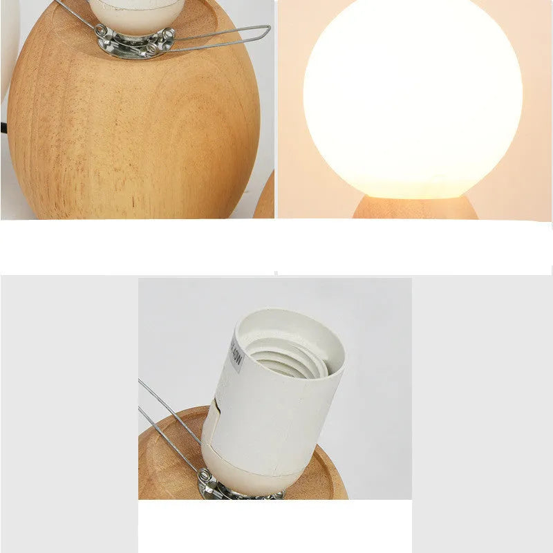 Nordic style glass ball table lamp with LED lighting on wooden surface