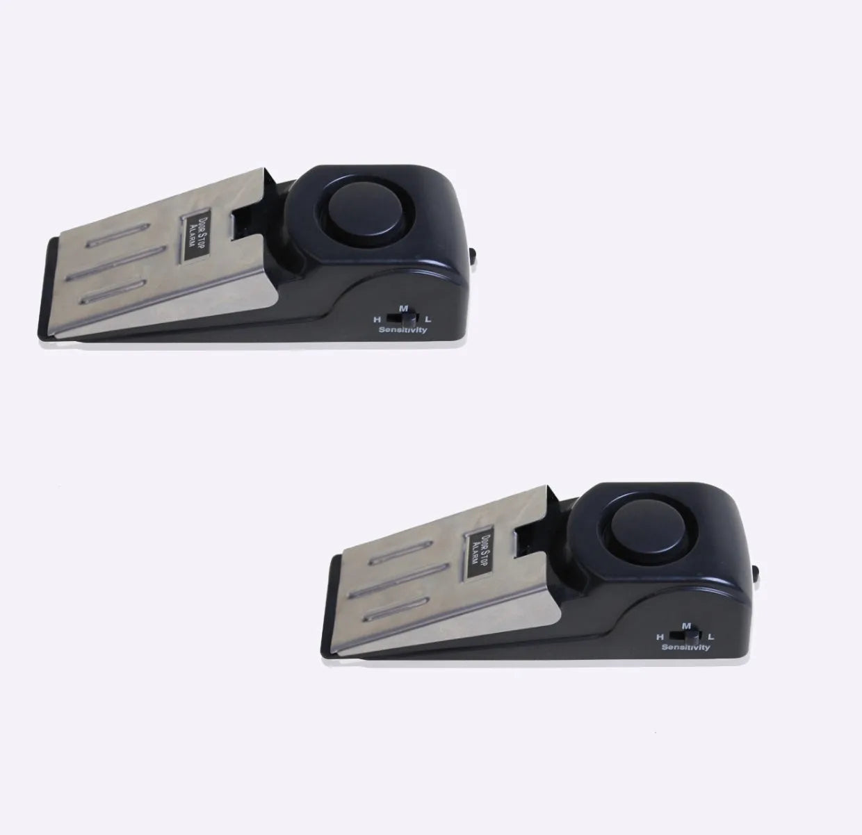 Black portable wedge-shaped door stop alarm with a stainless steel cover for home and travel security.