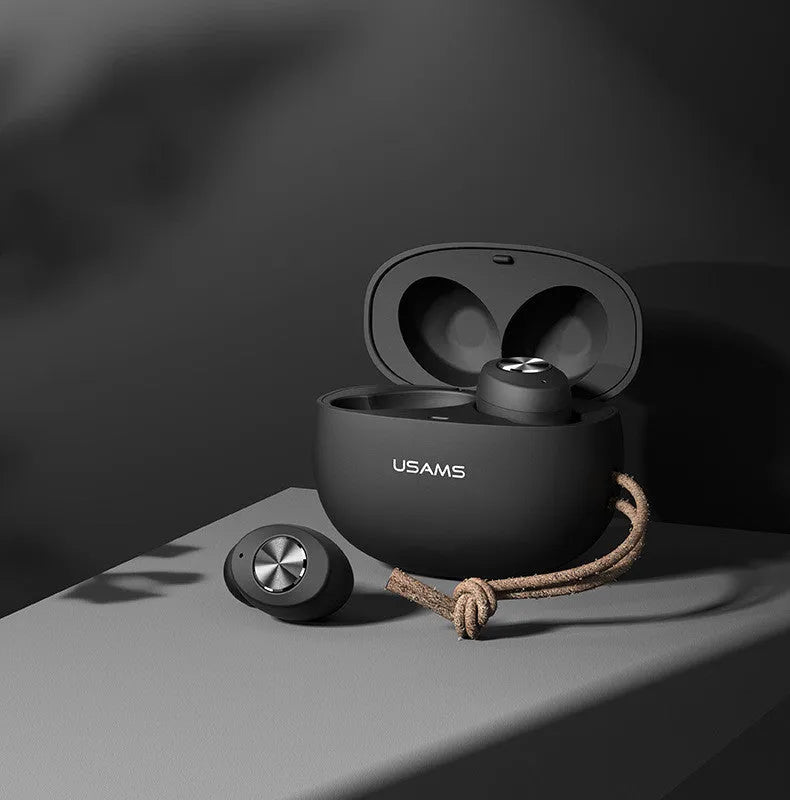 Wireless Bluetooth mini TWS earbuds in black, white, and green with a compact charging case.
