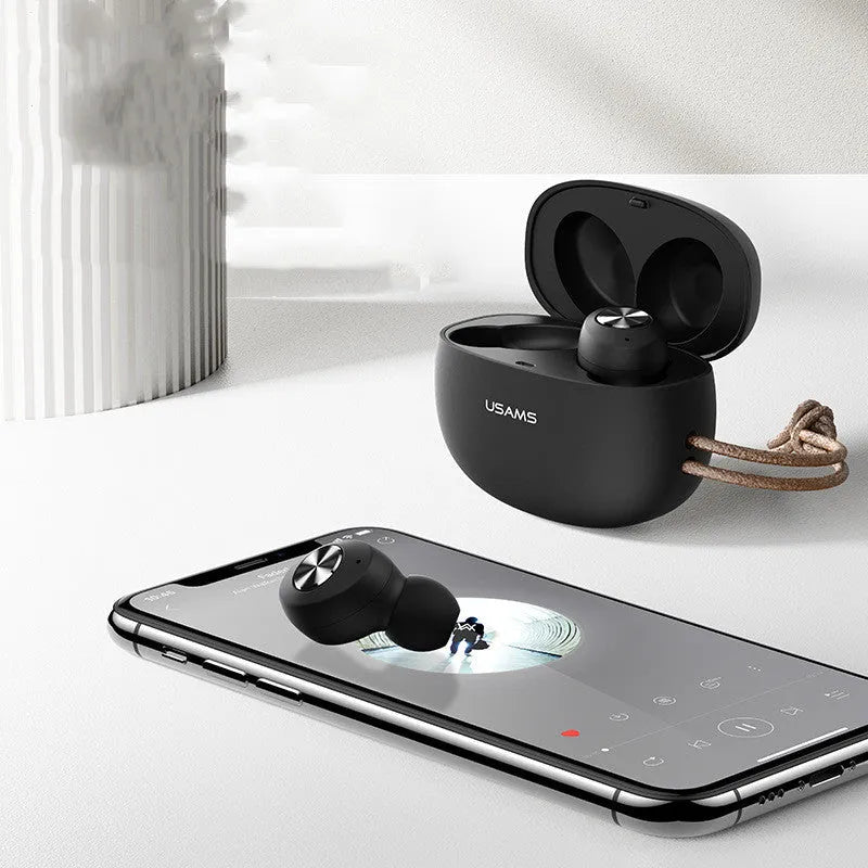 Wireless Bluetooth mini TWS earbuds in black, white, and green with a compact charging case.