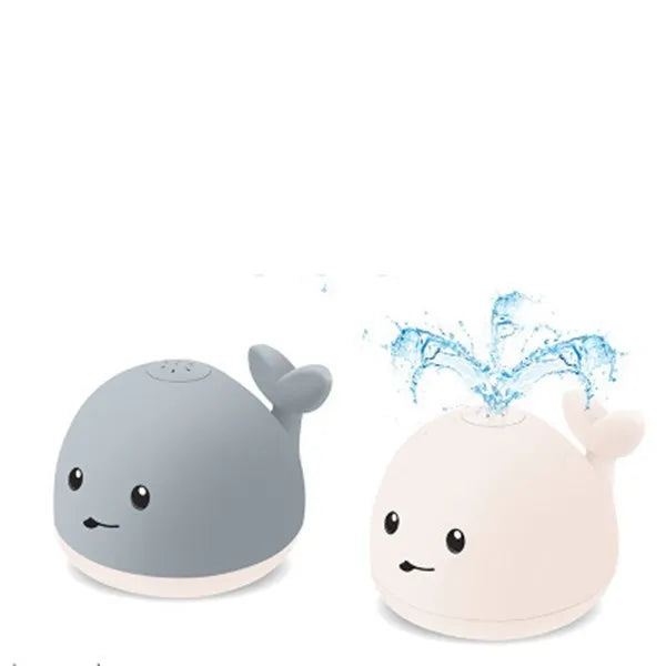 Grey whale bath toy spraying water with LED lights in baby bath
