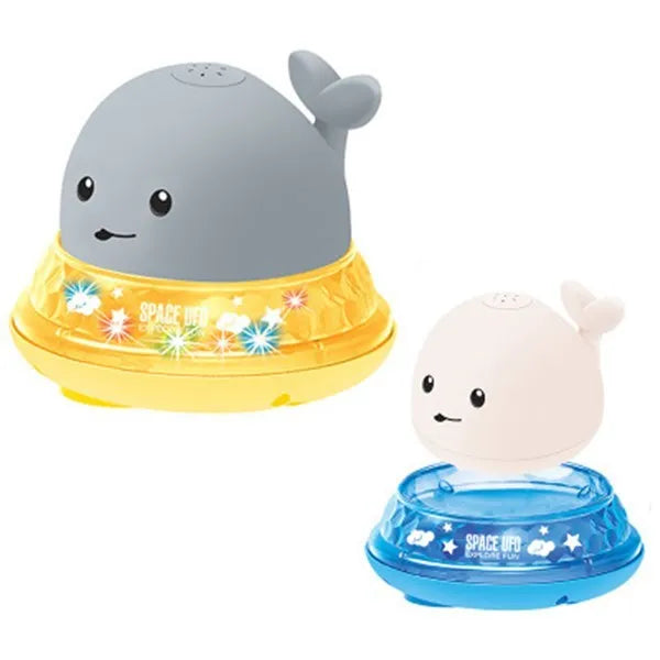 Grey whale bath toy spraying water with LED lights in baby bath