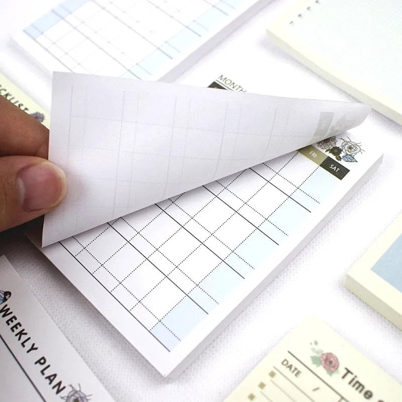 A6 weekly monthly work plan diary showing four different cover design options