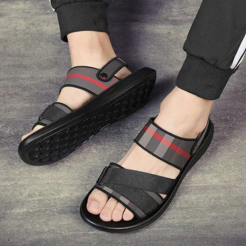 Youth sports sandals with blue Lycra upper and light polyurethane sole on a summer background.
