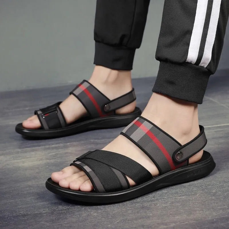 Youth sports sandals with blue Lycra upper and light polyurethane sole on a summer background.