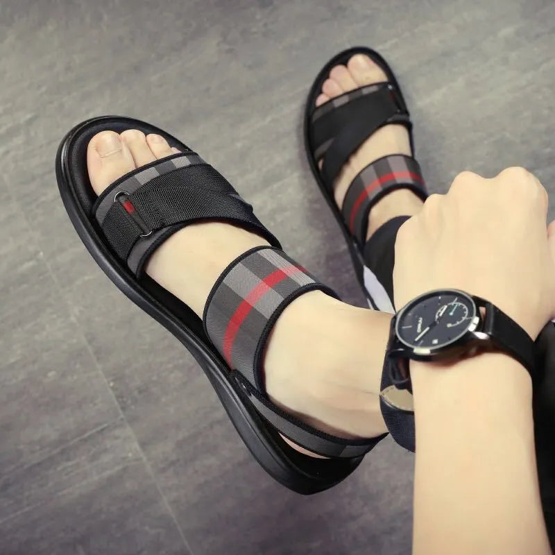 Youth sports sandals with blue Lycra upper and light polyurethane sole on a summer background.