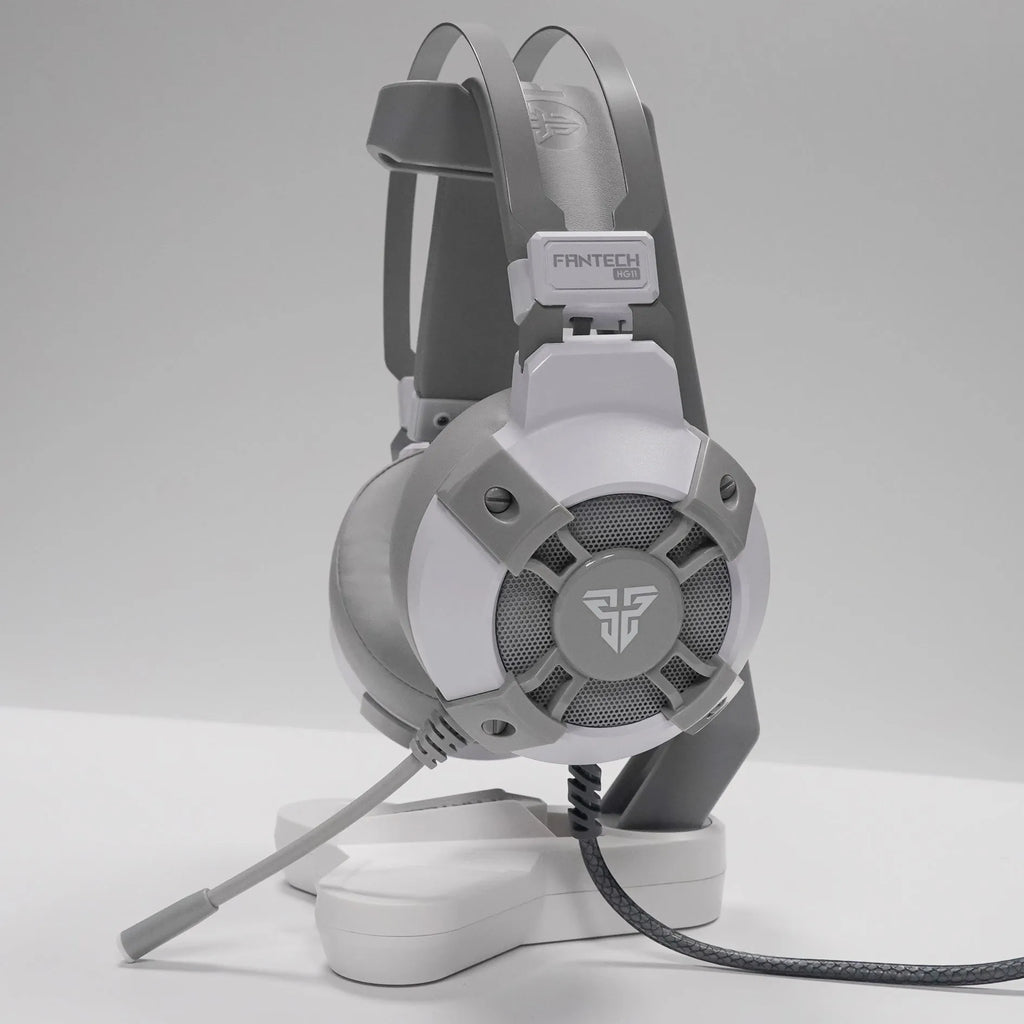 Black FANTECH HG11 over-ear USB gaming headset with RGB lights on the ear cups.