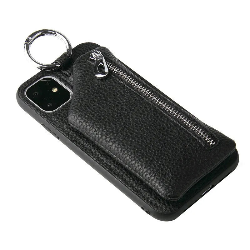 Pink imitation leather phone case with built-in coin pouch and a black crossbody neck lanyard attached.
