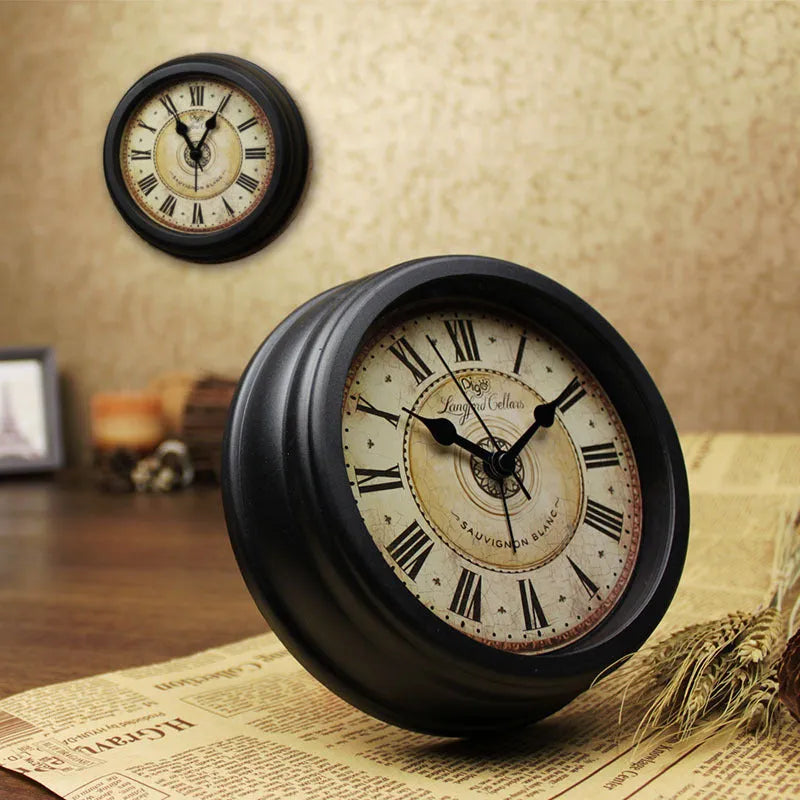 European retro style round desk clock with silent alarm on wooden table