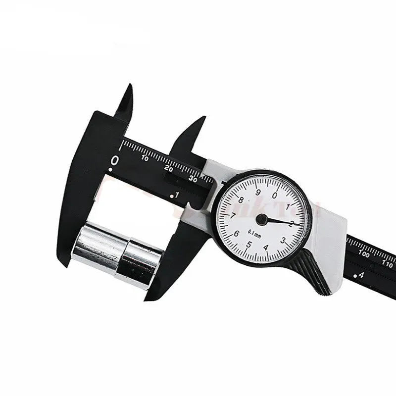 Black and white plastic vernier caliper showing 0-150mm scale and measuring jaws