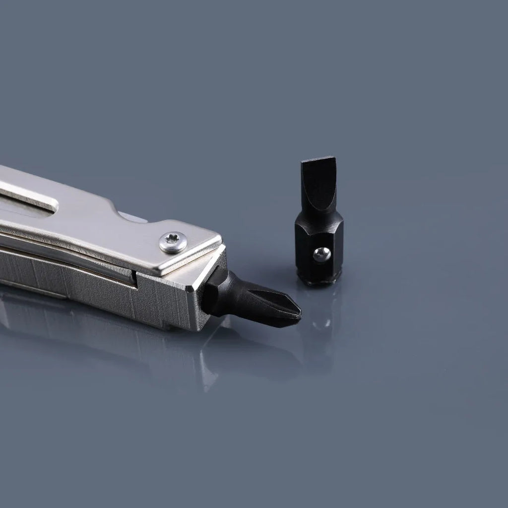 White stainless steel multi-function tool combining a wrench, knife, and needle-nose pliers