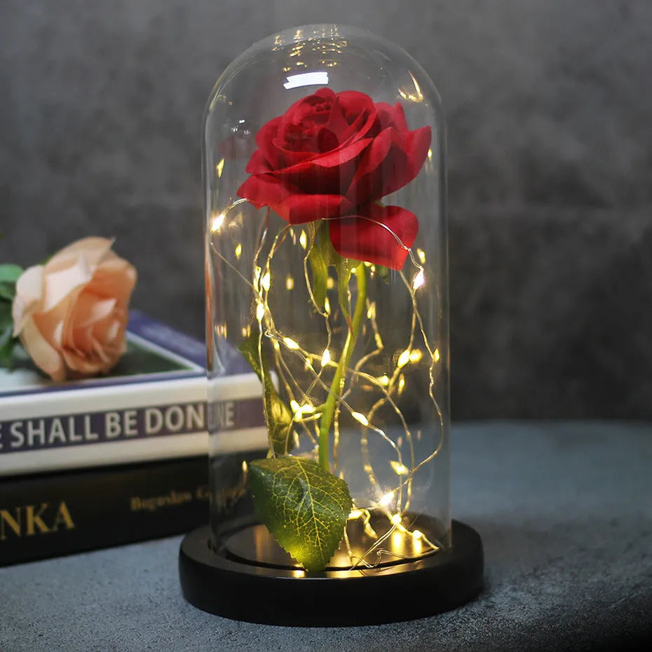 LED illuminated silk rose bouquet ornament with glass cover in gift box.
