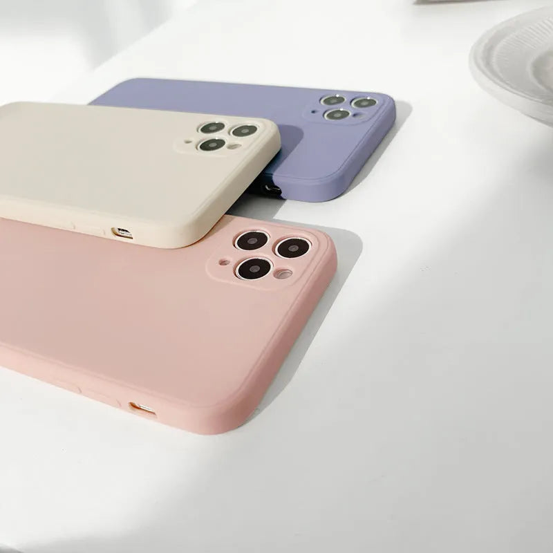 Slim solid colour silicone phone case for iPhone on a flat surface.