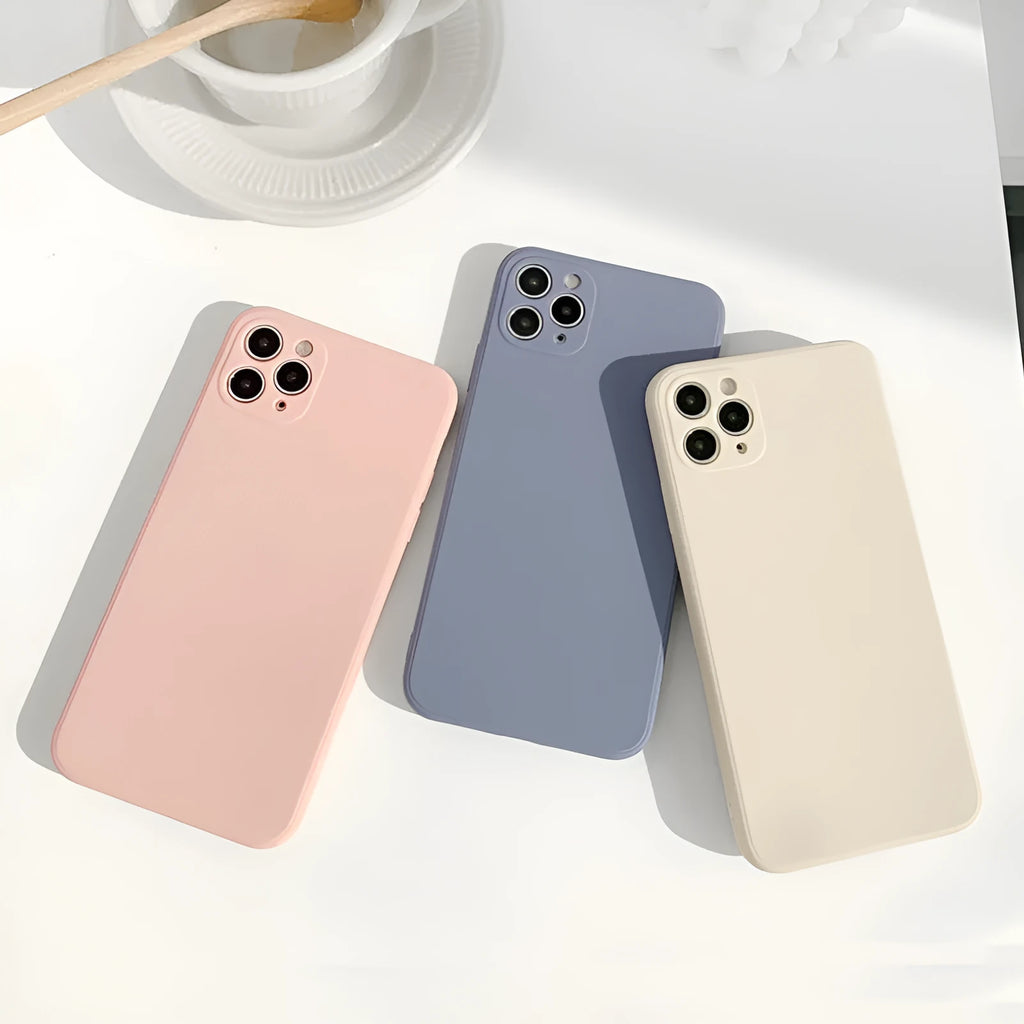 Slim solid colour silicone phone case for iPhone on a flat surface.